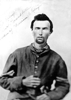 Black and white photograph of Corporal John Reiley (Riley) of Company B in his Civil War uniform