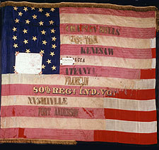 Color photograph of the 80th Indiana's National flag with battle honors: Chaplin HIlls, East. Tenn., Kenesaw, Resaca, Atlanta, Franklin, Nashville, and Fort Anderson
